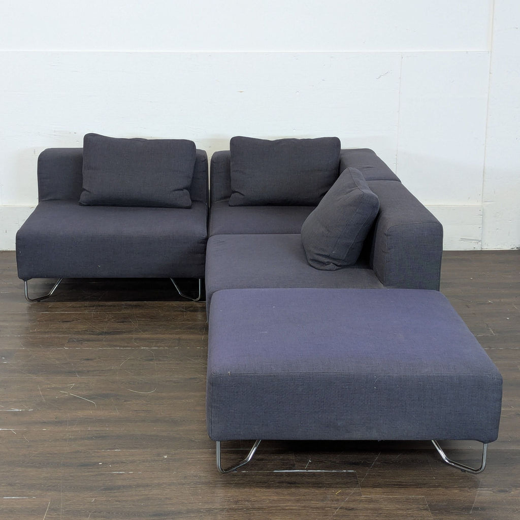 2. Spacious modular sectional with plush cushions and neutral-toned upholstery in a living room setting.