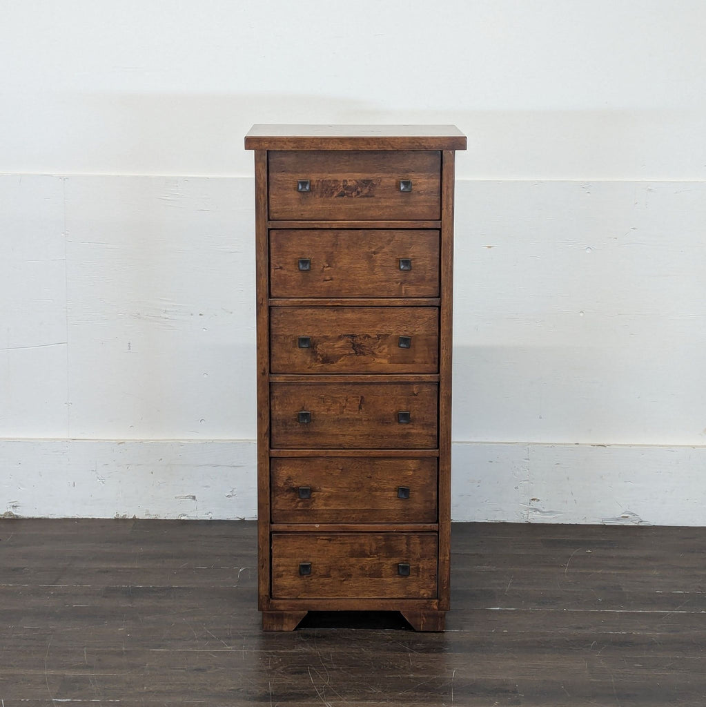 1. Modern wooden dresser with six spacious drawers and sleek metal handles.