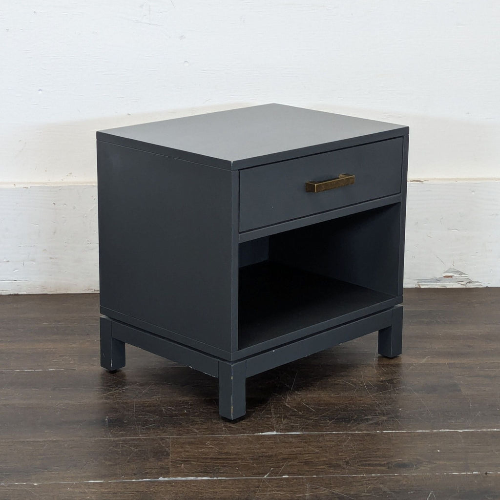 Sturdy white end table by "Land of Nod," displayed in excellent shape, fits as nightstand or accent piece.