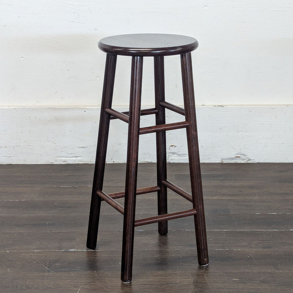 1. Modern upholstered ottoman with wooden legs, suitable for living rooms or bedrooms.  