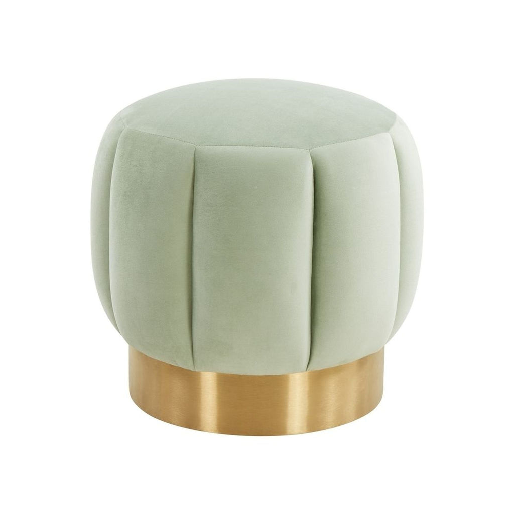 1. Reperch round ottoman with soft sage green velvet upholstery and wide gold metal base on white background.