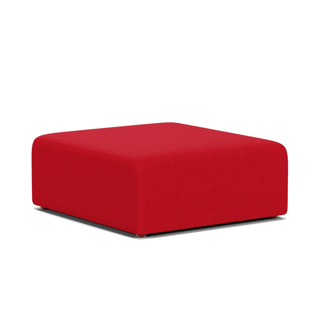 a red fabric ottoman with a white background.