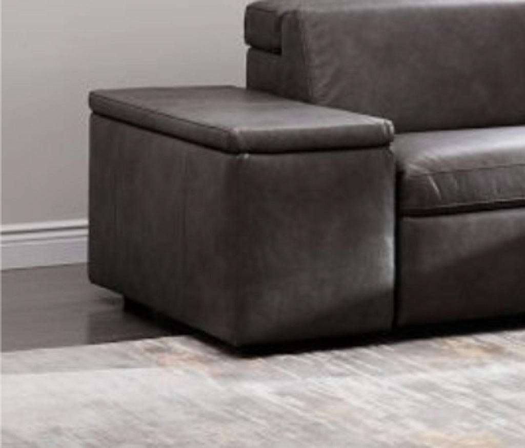 a brown leather couch with a ottoman.