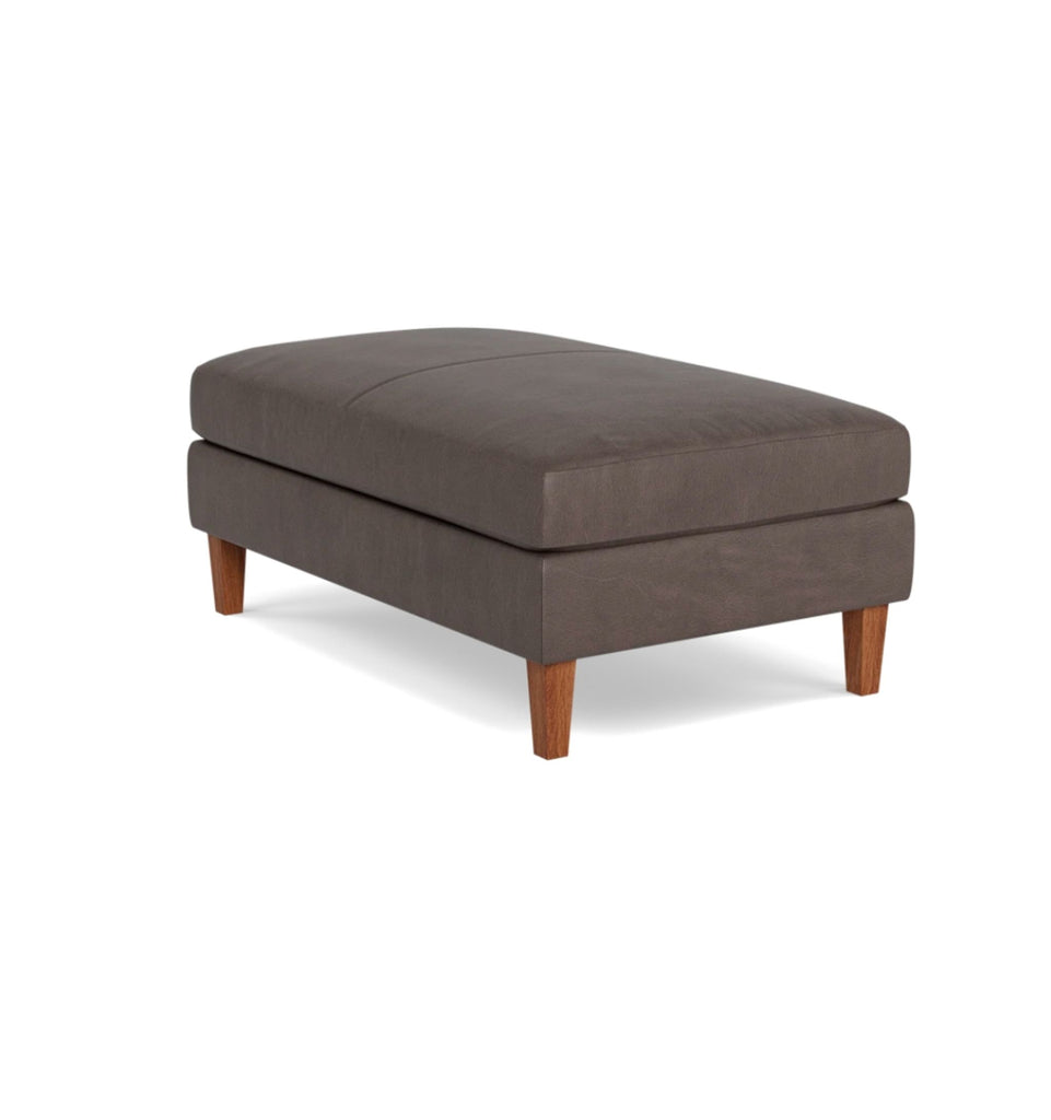 a pair of footstool in a dark grey fabric.