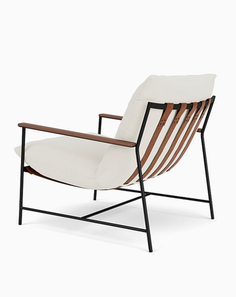 2. Reperch lounge chair shown from the back side, featuring brown leather straps and cushioned seating.  