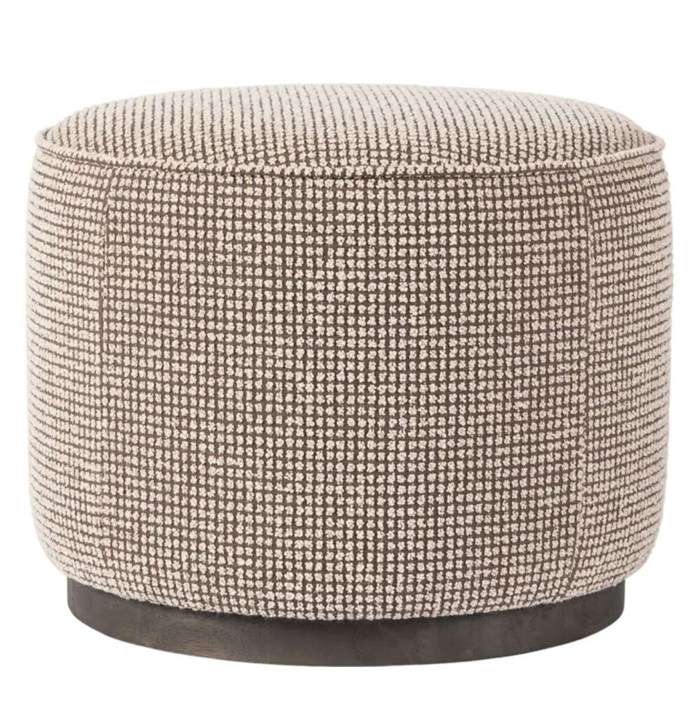Wide taupe upholstered bench with solid dark wood legs designed by Four Hands, featuring retro style.  