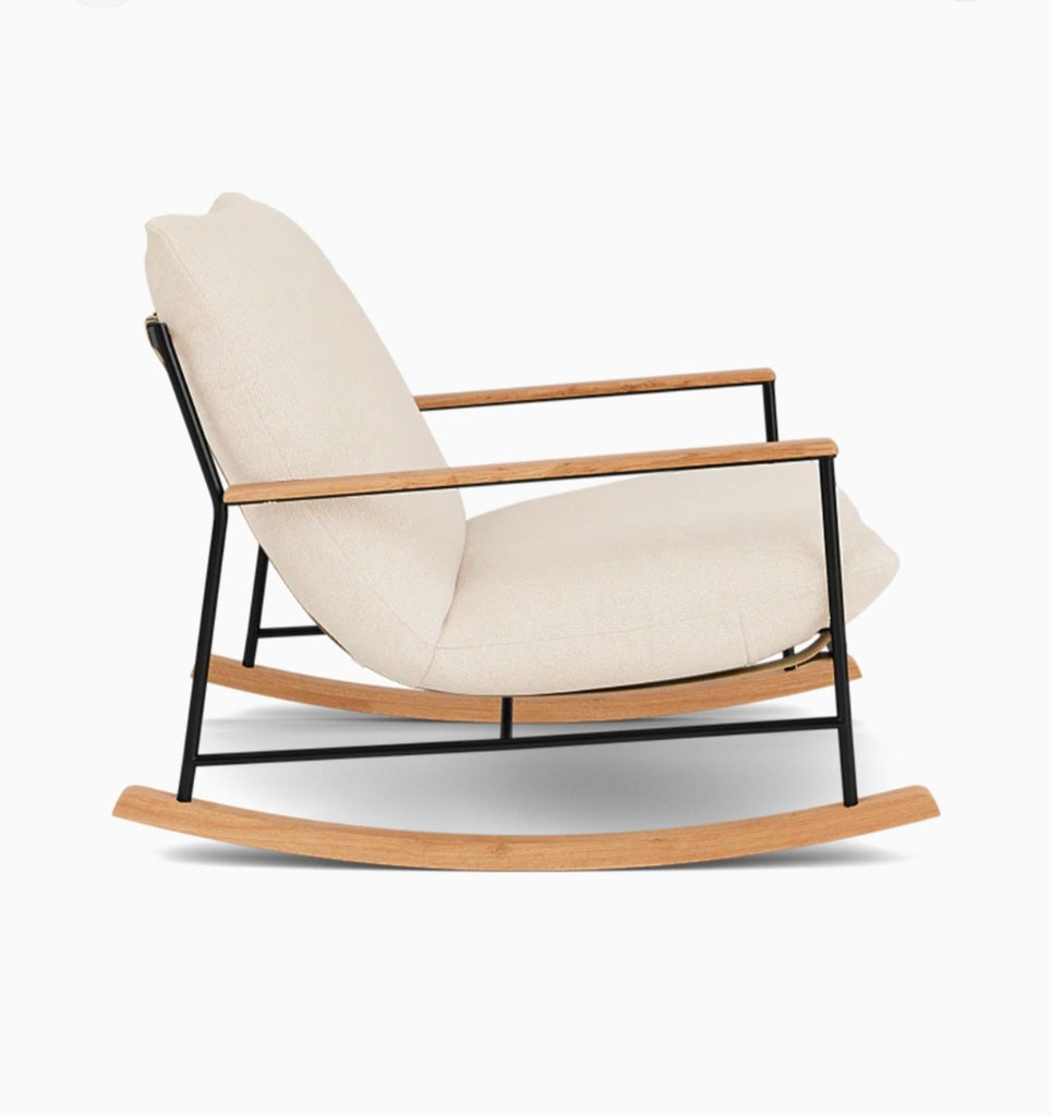 3. Side view of Denver Modern Indoor Vail Rocker from Denver Modern, showing soft oat fabric and curved wooden rockers.