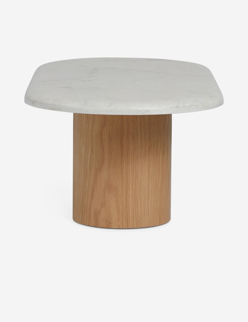 Minimalist Reperch coffee table with a single wood base and a curved marble surface.