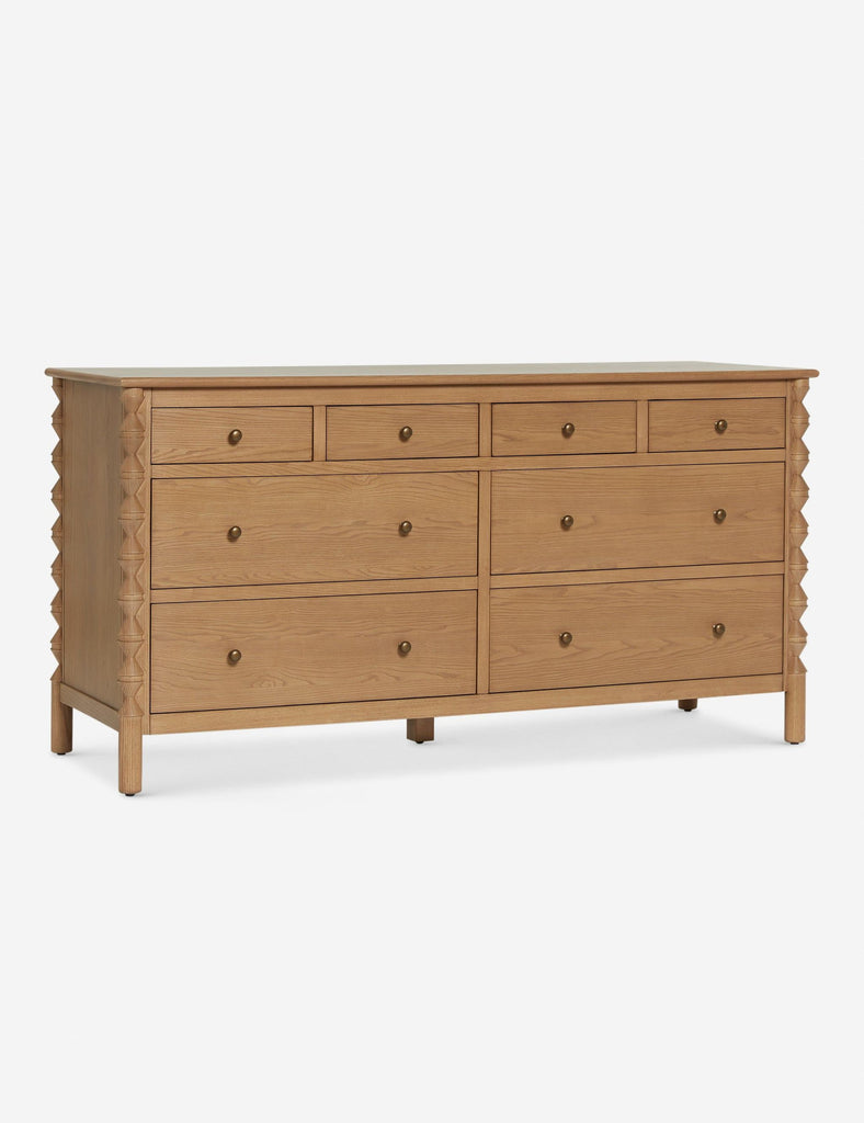 a large chest of drawers with four drawers.