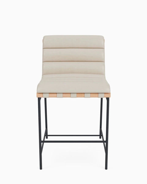 1. Modern stool with a beige cushioned seat, black metal frame, and light wood accents, shown from the front.