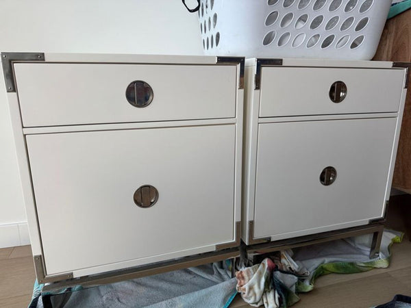 1. Pair of modern West Elm end tables in white finish with metal corner accents and circular drawer pulls.