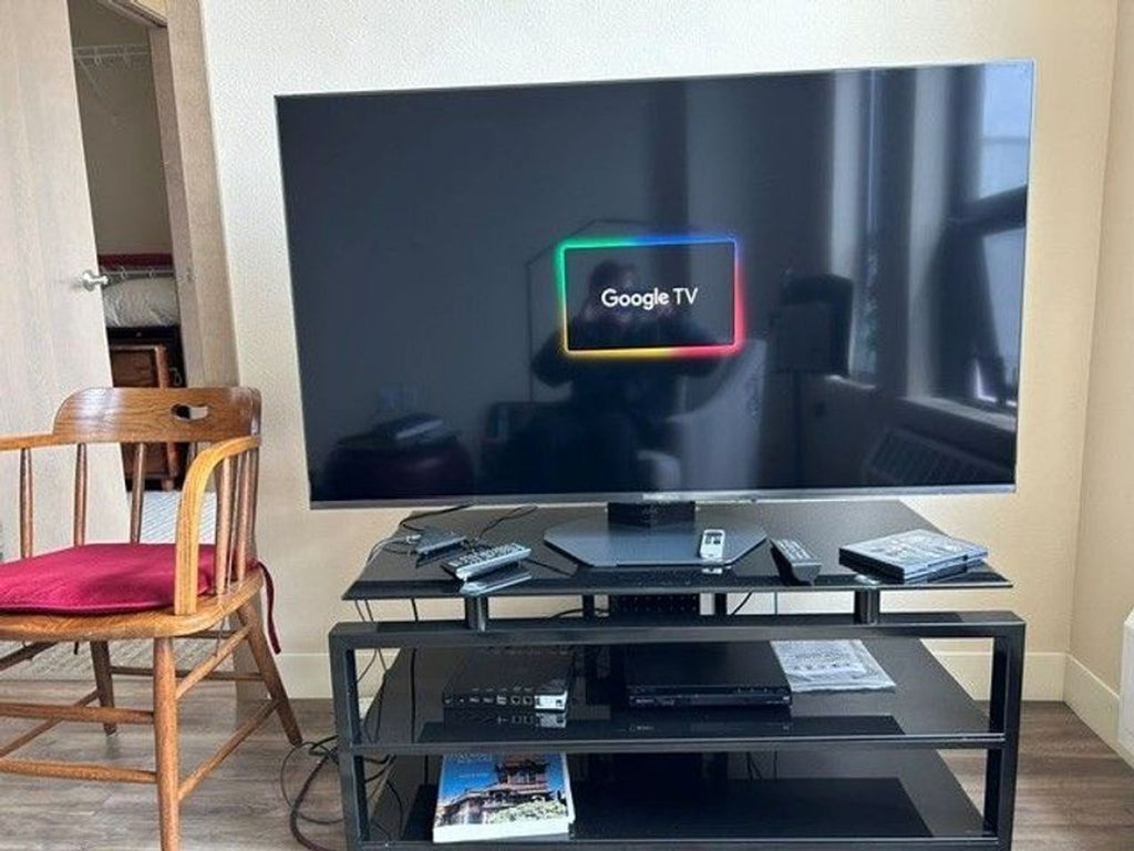 Certainly! However, since you did not provide the images or their full description, I will create three general sample alt texts for a TV in the TVs category: