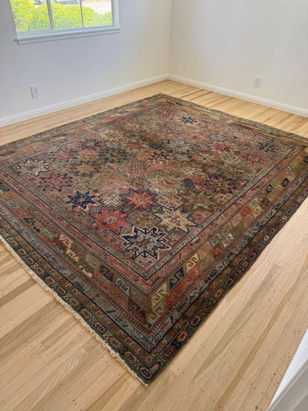 1. Intricately patterned Designer rug with geometric shapes, showcasing vibrant colors and modern style.