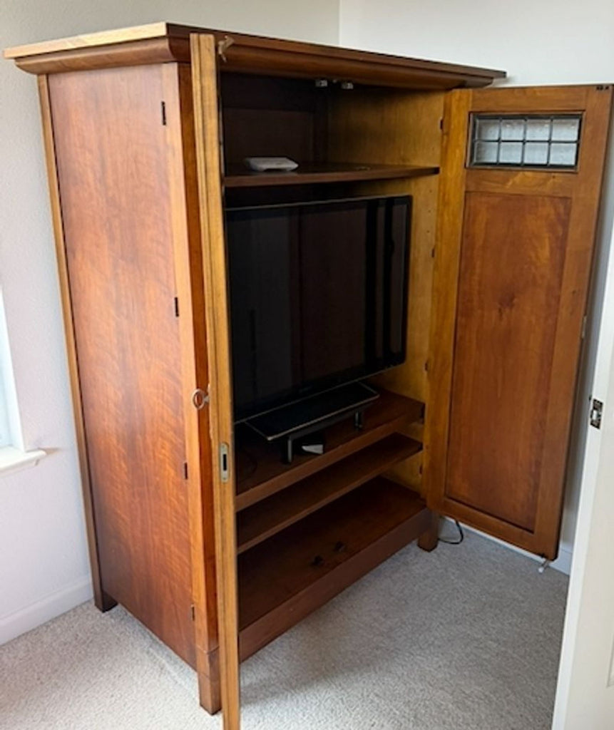 1. Modern wooden cabinet by Furniture Pic 9, shown in a home setting; 2004 price visible.