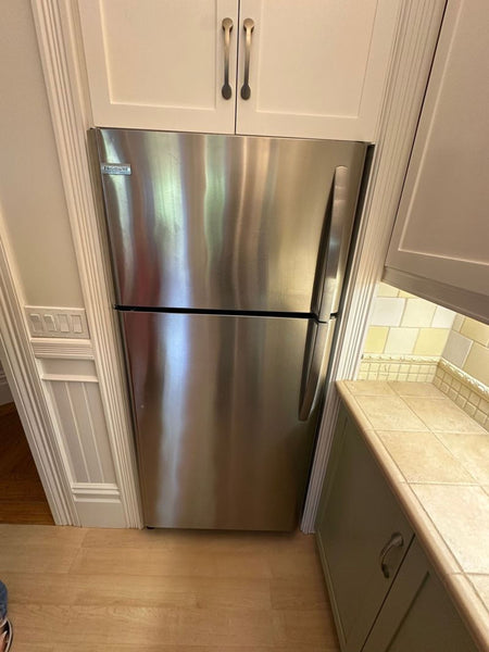 Certainly! Since you mentioned images but didn't provide them, I'll create three example alt texts based on the details you provided (category: Refrigerator, brand: Frigidaire, no specific model or visual features given):