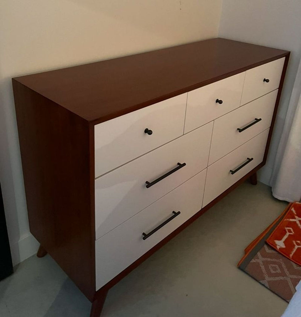 a dresser with a drawer and a drawer.