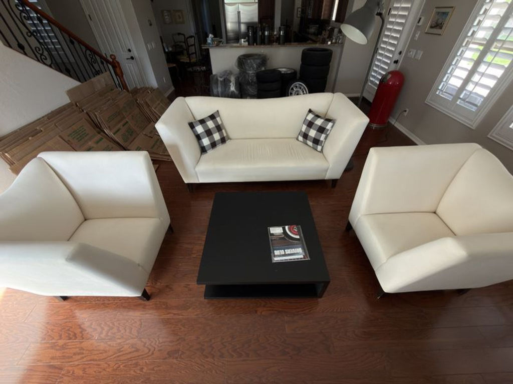 Lightly used Shabby Chic loveseat in cream upholstery, spacious for two, blends with various décor styles.
