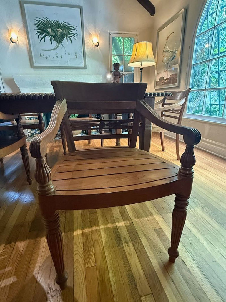 Classic dining set featuring a sturdy rectangular table and six comfortable armchairs with supportive backs.