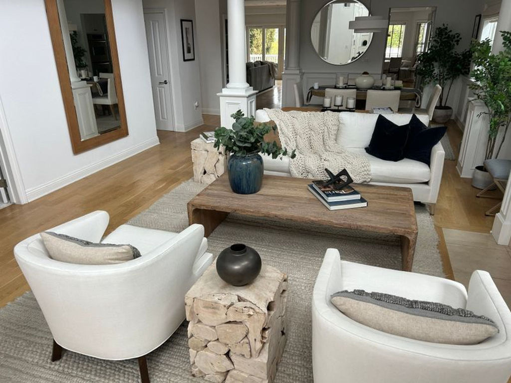 Set of contemporary white lounge chairs with curved arms and comfortable cushions, custom-designed in LA.