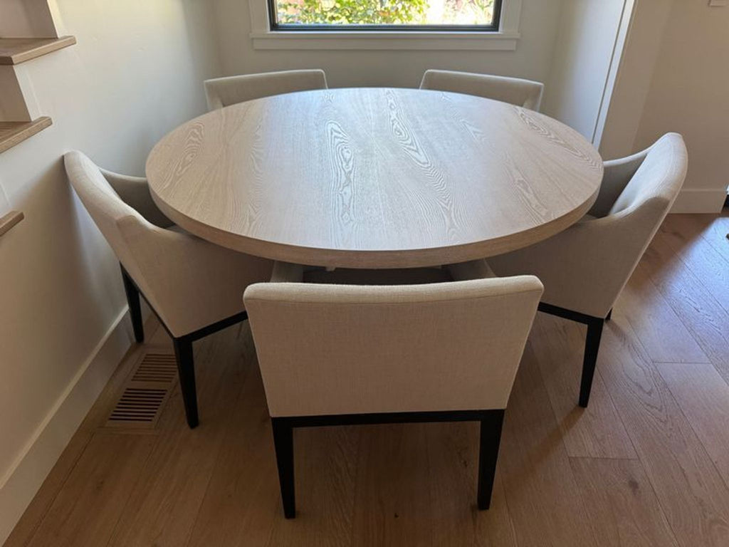 1. Modern dining set with a rectangular wooden table and six cushioned chairs.  