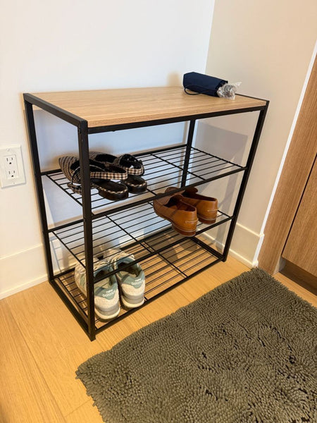 Sleek shoe rack with multiple shelves, designed as a side and console table for organized footwear storage.