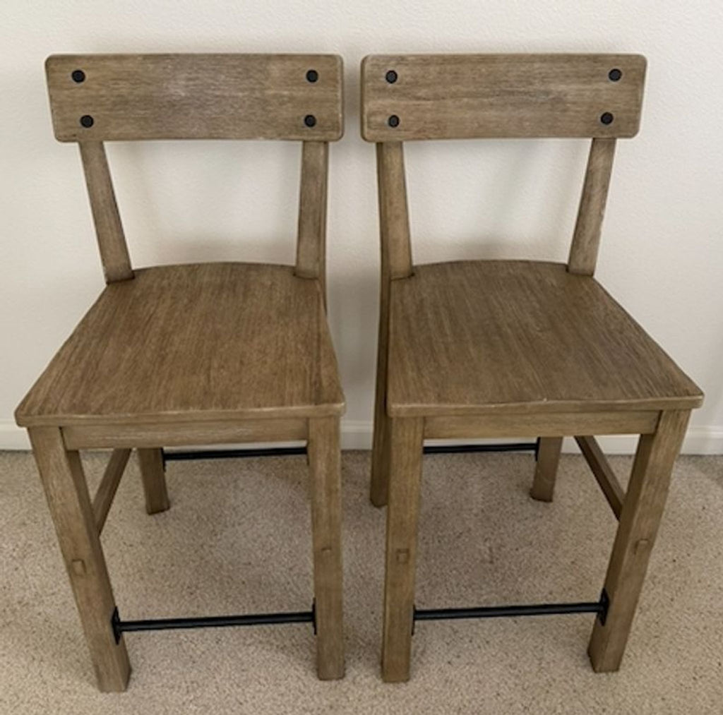 1. Modern ottoman bench with a cushioned top and wooden legs, ideal for contemporary living rooms.  