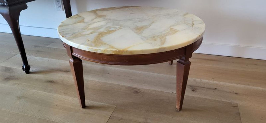 1. Modern rectangular coffee table with a glass top and wooden legs, suitable for contemporary living rooms.
