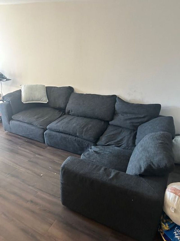 3. Restoration Hardware sectional, L-shaped and dark gray, fits various styles, slightly used but sturdy and family-friendly.
