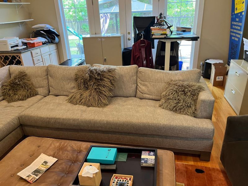 1. Elegant Swaim sectional sofa with plush cushions and modern design, ideal for spacious living rooms.