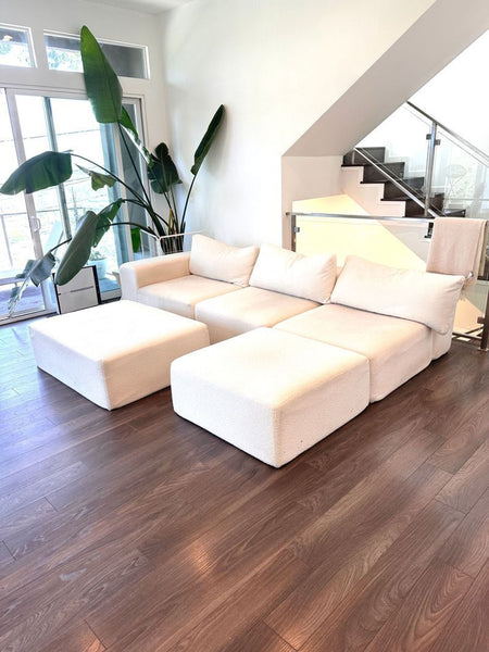 Cream Diorama sectional with two matching ottomans, spacious seating, and modular design, gently used, excellent condition.