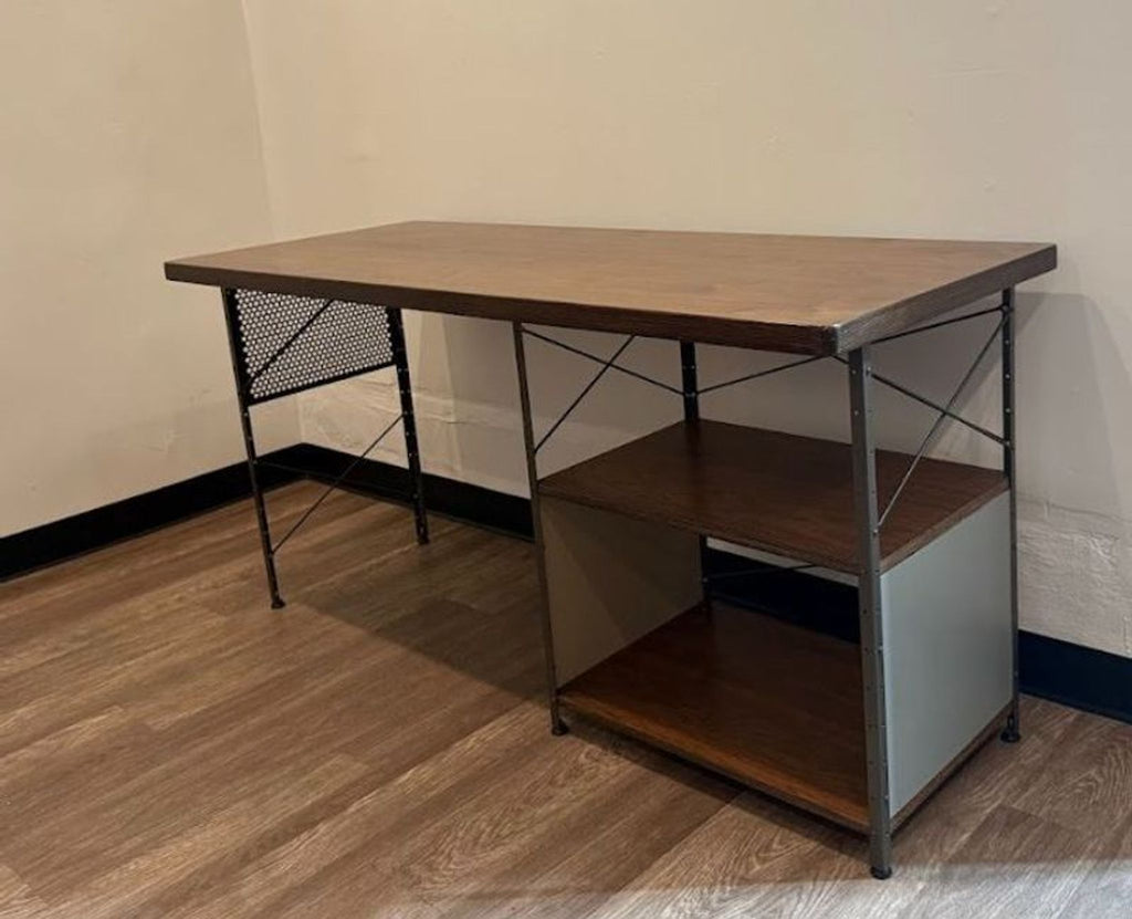 Simple Vitra office desk with large work area, metal frame, and convenient open shelving on the right side.