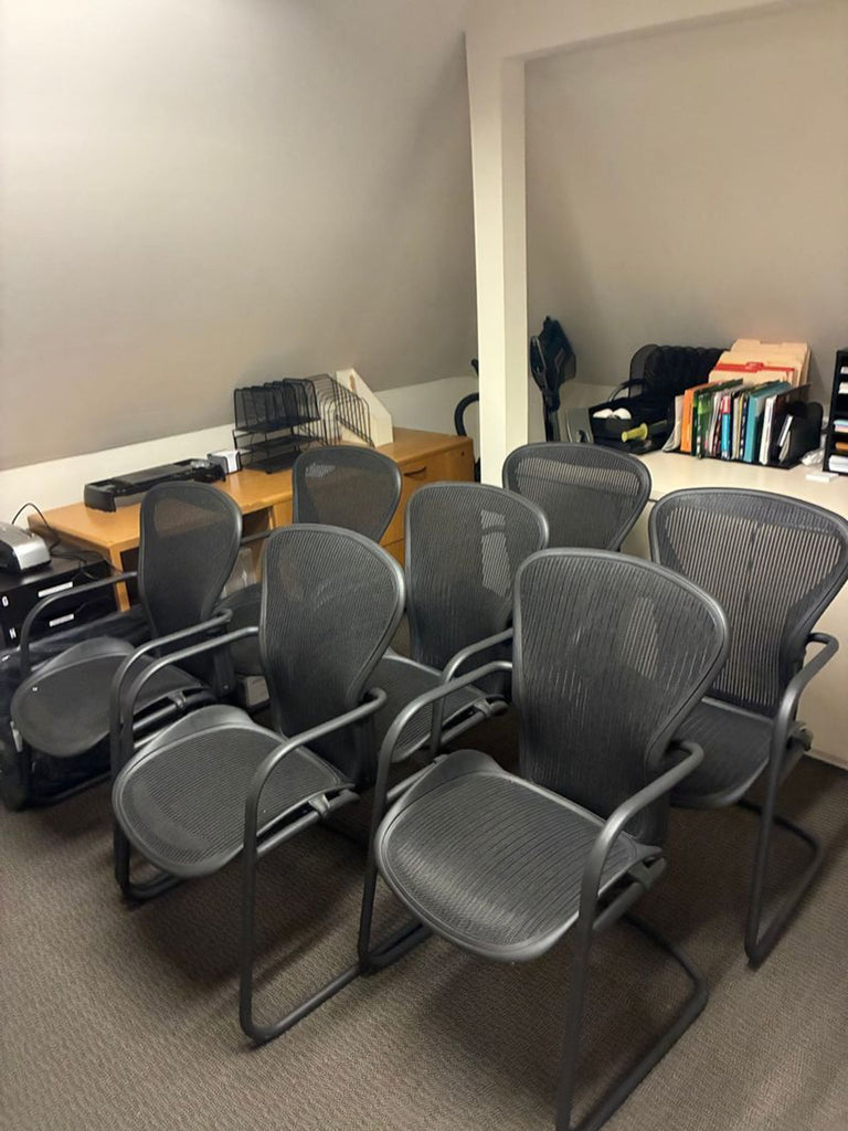Since the actual images are not visible or described, I will provide three distinct, general alt text options suitable for Herman Miller chairs, referencing the category, brand, and conveying variety:
