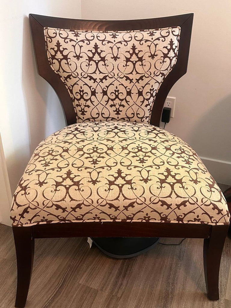1. Elegant high-end lounge chair with sleek lines and plush upholstery, perfect for sophisticated interiors.  