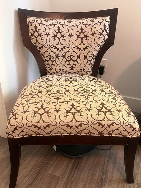 1. Elegant high-end lounge chair with sleek lines and plush upholstery, perfect for sophisticated interiors.  