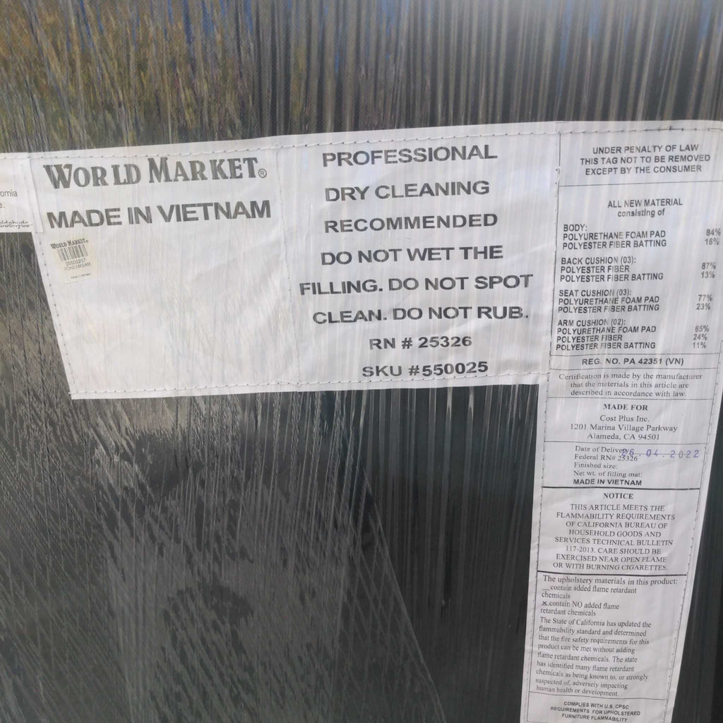 1. Label on Reperch 3-seat item with dry cleaning instructions and material info, wrapped in protective plastic.