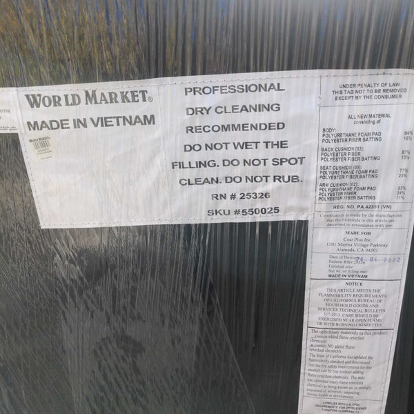 1. Label on Reperch 3-seat item with dry cleaning instructions and material info, wrapped in protective plastic.