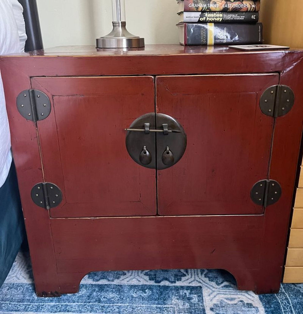 1. Sleek red lacquer end table with a drawer and gold accents, branded as Red lacquer nightstand-1.  