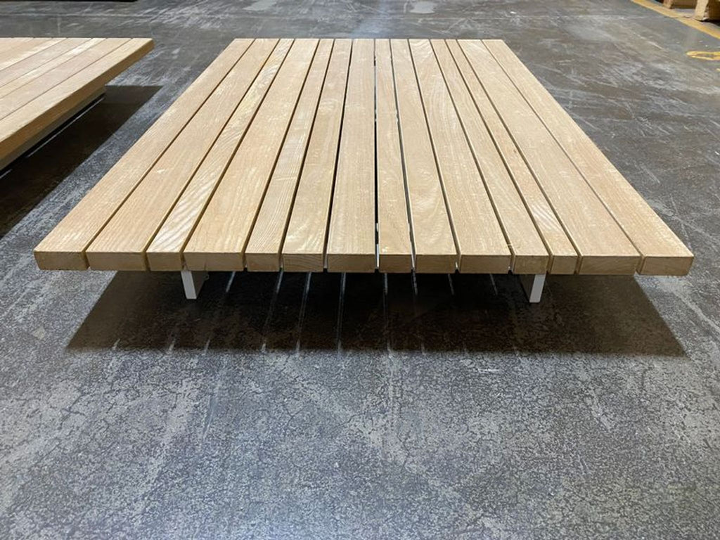 Paola Lenti Sunset coffee table from 2015 with a modern, minimalist design, priced at $4500.  