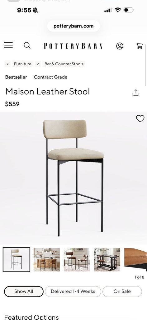 2. Stylish Maison Leather Barstool by Pottery Barn, designed with a cushioned brown leather seat and sturdy frame.