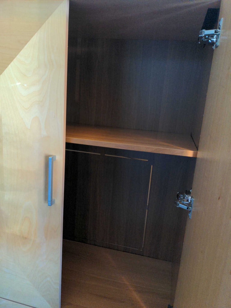 2. Contemporary TV stand with symmetrical shelving for electronics, books, and decorative items.