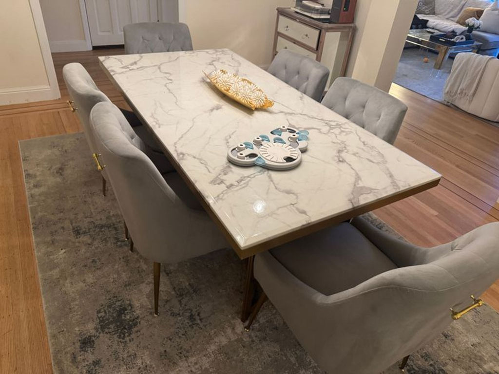 Wayfair dining set featuring a marble table with matching chairs.  