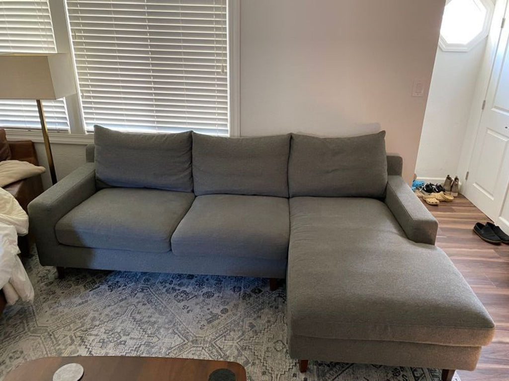 1. Interior Define Sloan sectional with left chaise, heather fabric and double down blend cushions, shown in a living room.  