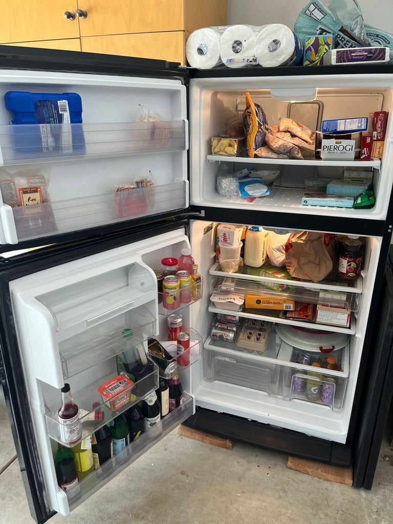 - Sleek Whirlpool fridge in stainless steel, featuring spacious interior and chic design for efficient cooling.  