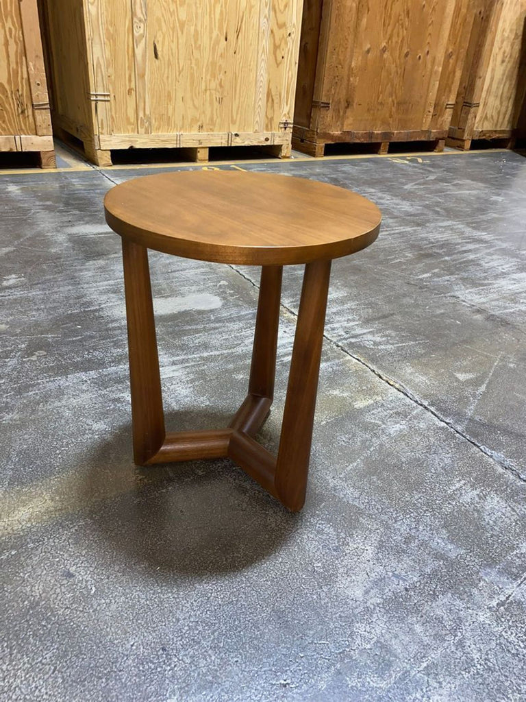 A modern Madame Y side table with a minimalist design, displayed as an end table from 2015.