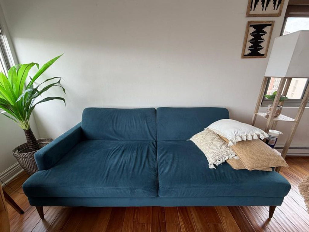 Sure! However, it appears that you intended to provide images or a full description for the item, but none were attached in your message. Based on the information you did provide ("category 3-seat", "brand Pottery Barn", "Reclinable couch"), I’ll make three distinct summarized descriptions for alt text.