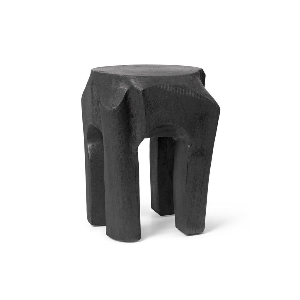 Black carved wooden stool with a sculptural, chunky design from the brand Reperch.