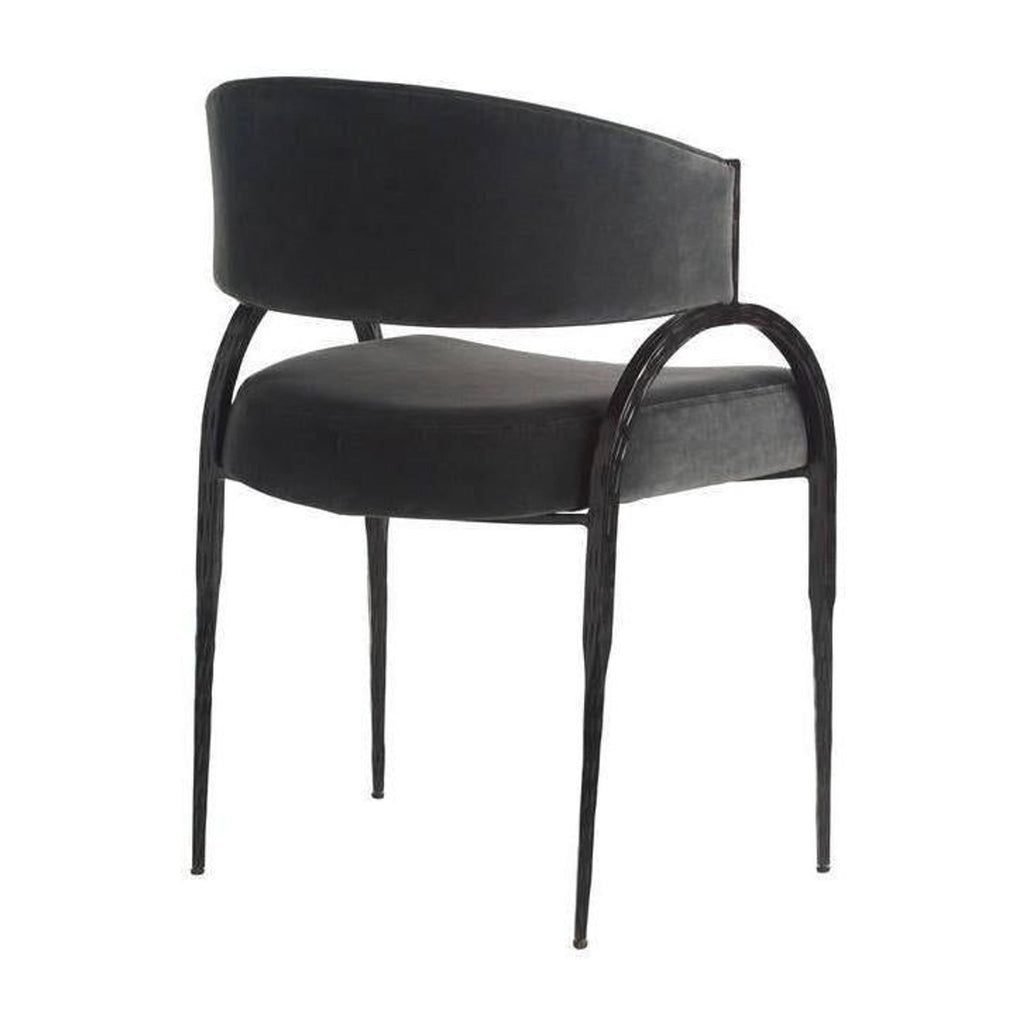 3. Rear angled view of Reperch black chair, highlighting its rounded backrest, padded seat, and slim metal legs.
