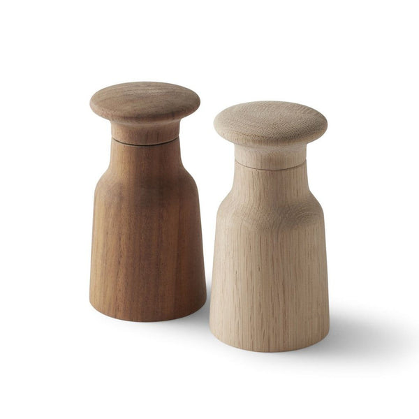 A pair of Reperch brand wooden grinders in light and dark finishes, featuring a minimalist, modern design.