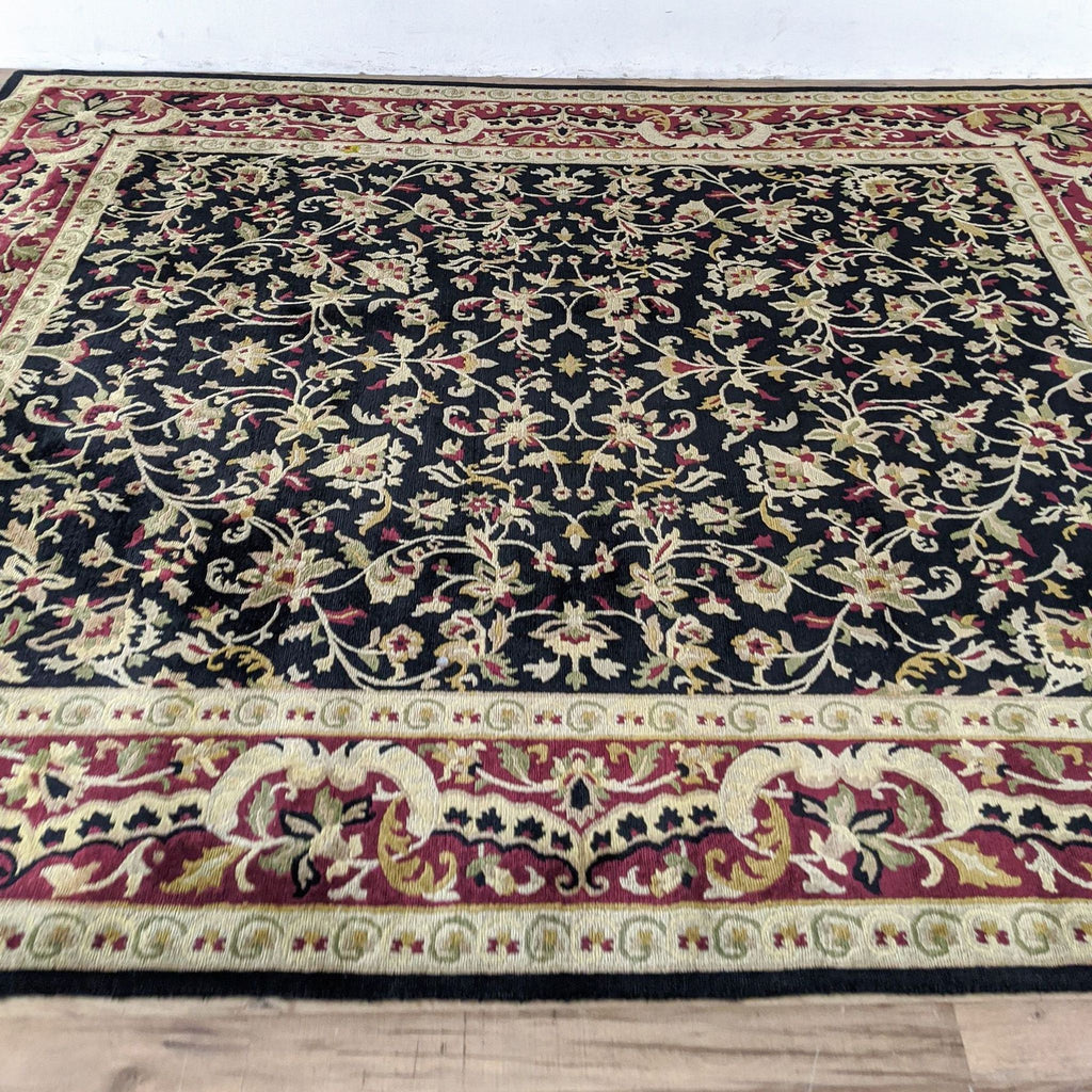 a large persian rug with a floral pattern.