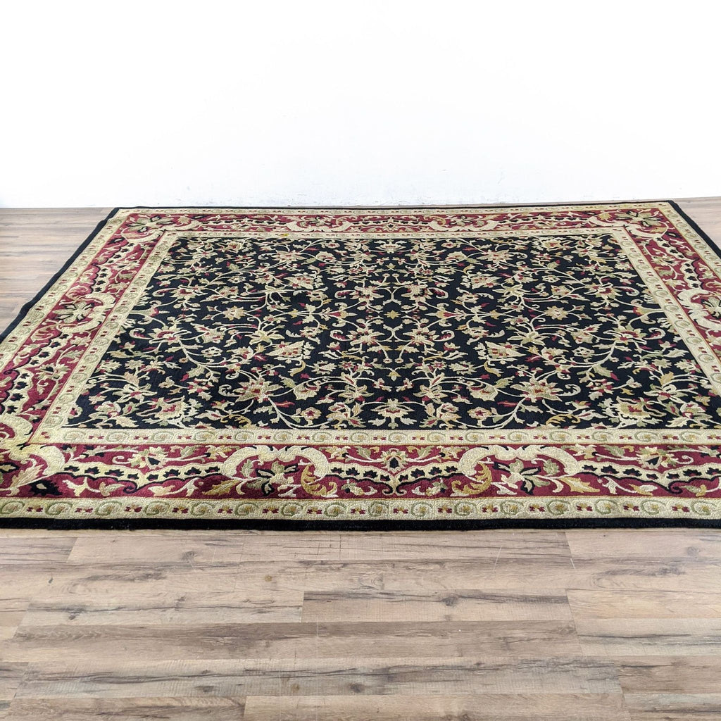 a large persian rug with a floral pattern